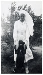 Matron Weber with her dog, Muttaburra Hospital ca. 1937